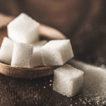 Raw sugar futures stabilize after falling on lower energy prices and changing ethanol production incentives